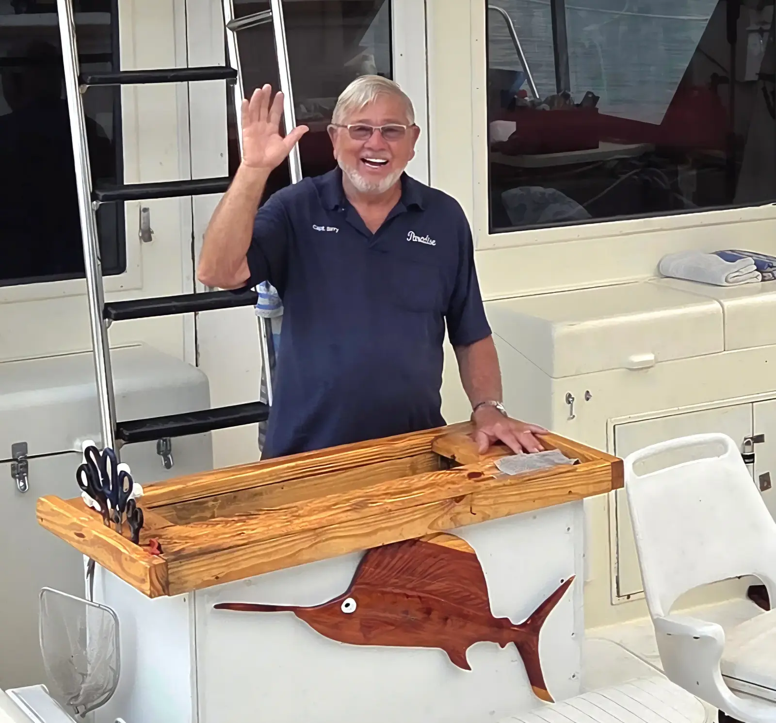Captain Barry Spieler at the rigging table aboard the Magic, docked in Key West