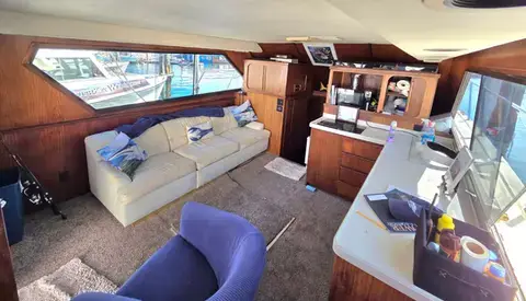 The wood paneled interior cabin of the Magic sportfishing boat