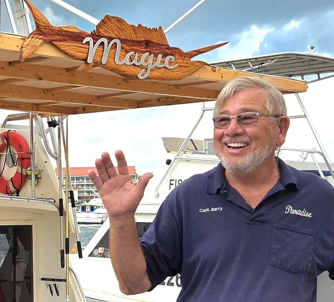 Angler holding a mangrove snapper caught near Key West