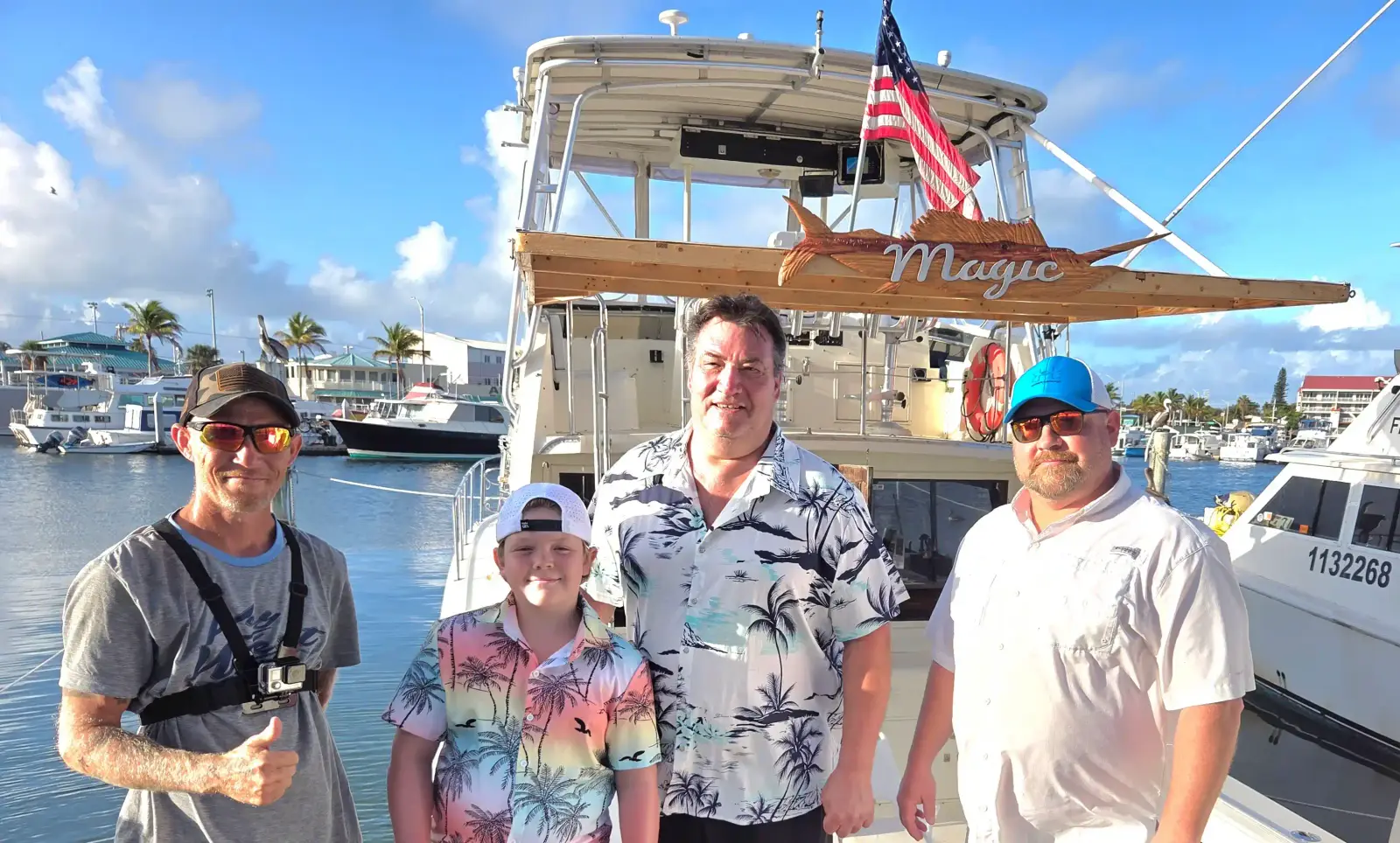 A family group posing together after a Key West charter fishing trip
