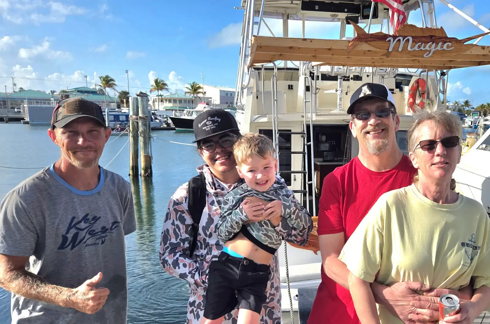 Family and friends celebrating a day of fishing in Key West